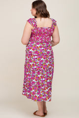 woman wearing a floral maternity plus maxi dress with ruffle straps, seen from the back
