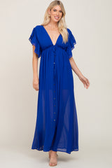 woman wearing a royal blue maxi dress with flutter sleeves and a button-down front