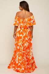 maternity wear off-the-shoulder maxi dress in orange and white floral print with a flowy skirt and ruffled sleeves