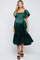 woman wearing a dark green maternity dress with flutter sleeves and a smocked bodice, showcasing her baby bump