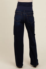 maternity wear dark blue bootcut jeans viewed from the back, featuring a stretchy waistband