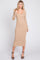 woman wearing a fitted beige ribbed midi dress with long sleeves and a scalloped neckline