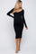 woman wearing a black ribbed maternity dress with a v-neck and long sleeves, showcasing her baby bump