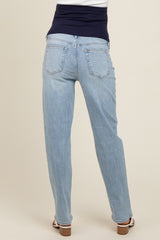 maternity wear in light blue straight leg jeans with a dark blue supportive waistband, model viewed from the back