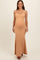 woman wearing a light brown ribbed maternity maxi dress with thin straps and showing her baby bump