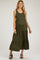woman wearing an olive green sleeveless maternity maxi dress with tiered ruffles and a visible baby bump