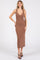 woman wearing a brown ribbed midi dress with a v-neckline and fitted silhouette, standing and smiling